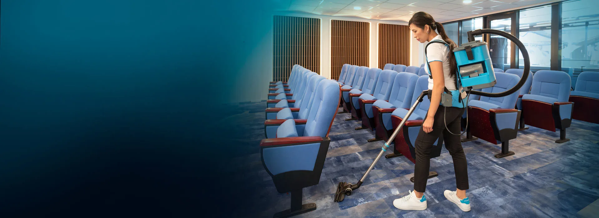 i move 4b cordless backpack vacuum cleaner in a conference room